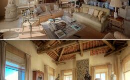 Spacious and elegantly designed living room with natural light, featuring a comfortable sofa, stylish chairs, and artistic decor elements, including sculptures and a wooden ceiling.