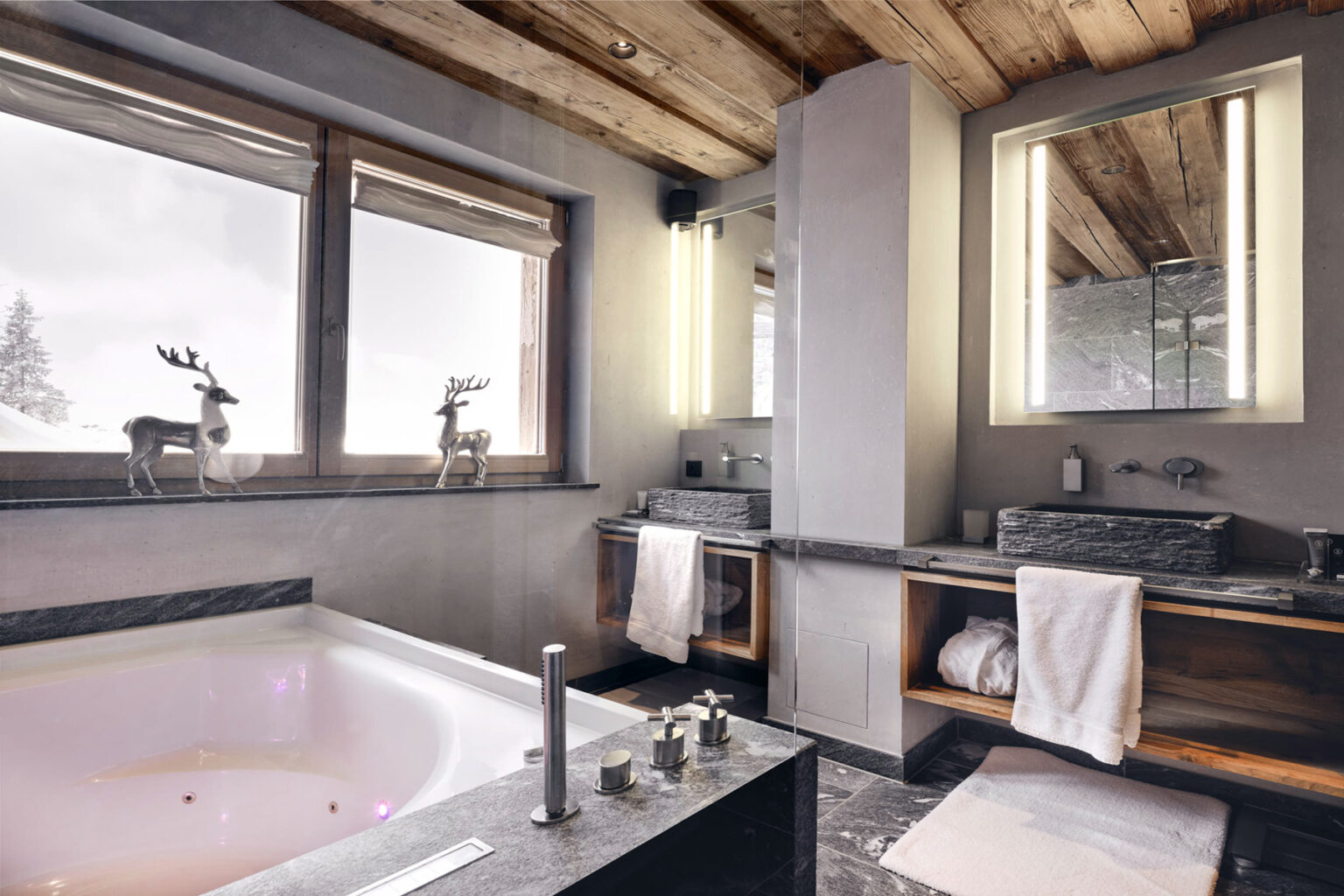 Luxurious modern bathroom featuring a freestanding bathtub, elegant marble countertops, and stylish wooden accents, with large windows offering scenic views and natural light. | Only on SopranoVillas