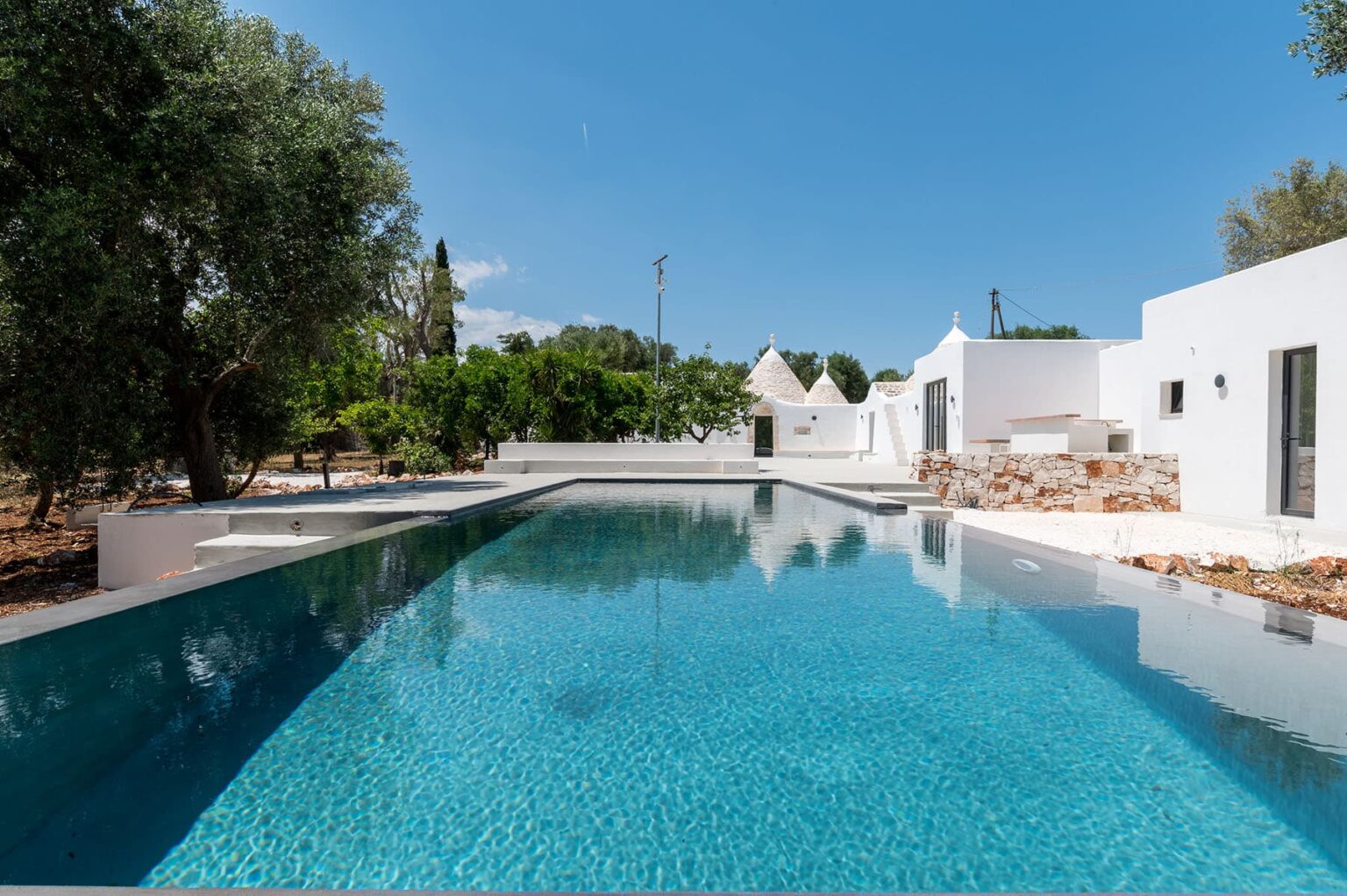 A luxurious Trulli complex with saltwater pool in an oasis of peace close to Ceglie Messapica, Apulia's gourmet capital | Only on SopranoVillas