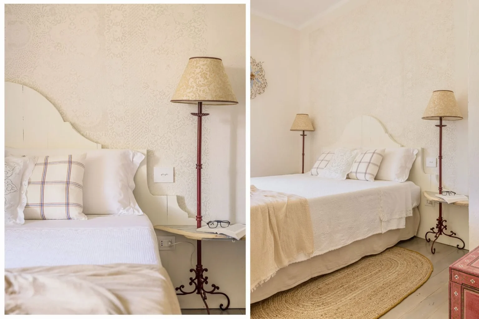 Cozy bedroom featuring a light-colored headboard, elegant pillows, and stylish bedside lamps. The room is adorned with textured wallpaper and a round jute rug, creating a warm and inviting atmosphere. A small wooden table holds a pair of glasses and a book, enhancing the tranquil setting. | Only on SopranoVillas