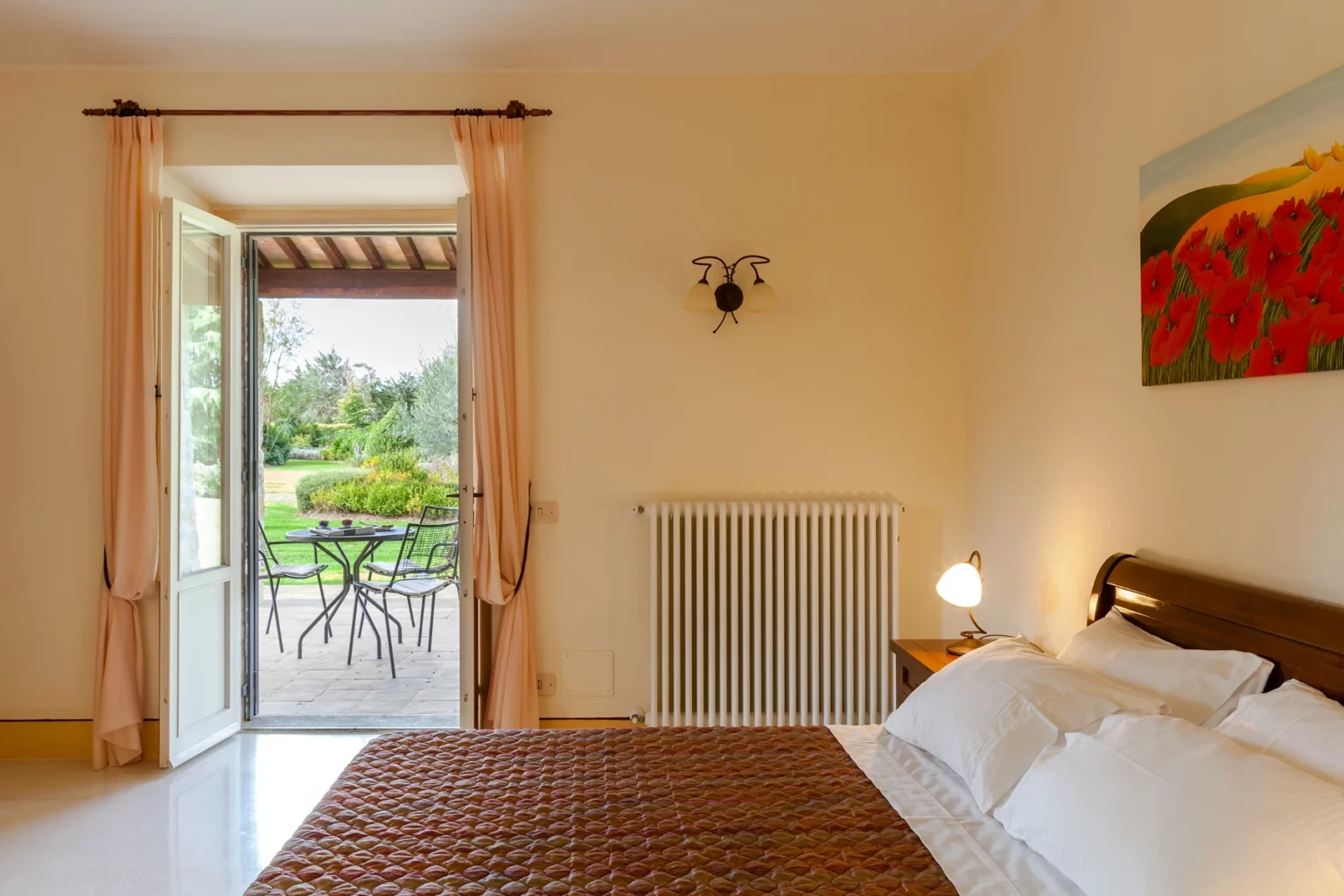 Bisenzio_Elegant_Farmhouse_Double_Bedroom_Private_Garden_Access.webp | Only on SopranoVillas