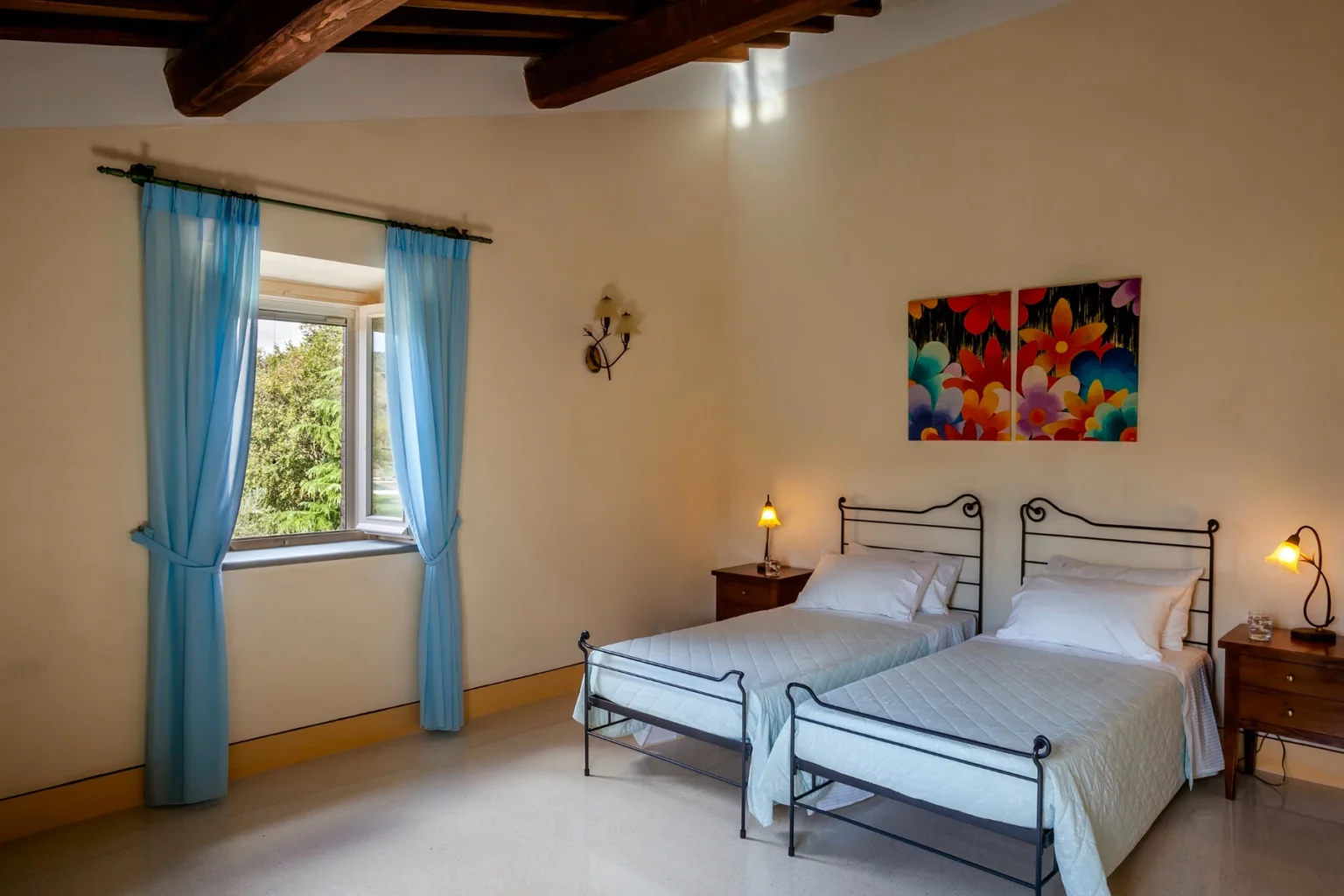 Bisenzio_Elegant_Farmhouse_Twin_Bedroom_Blue_Curtains.webp | Only on SopranoVillas
