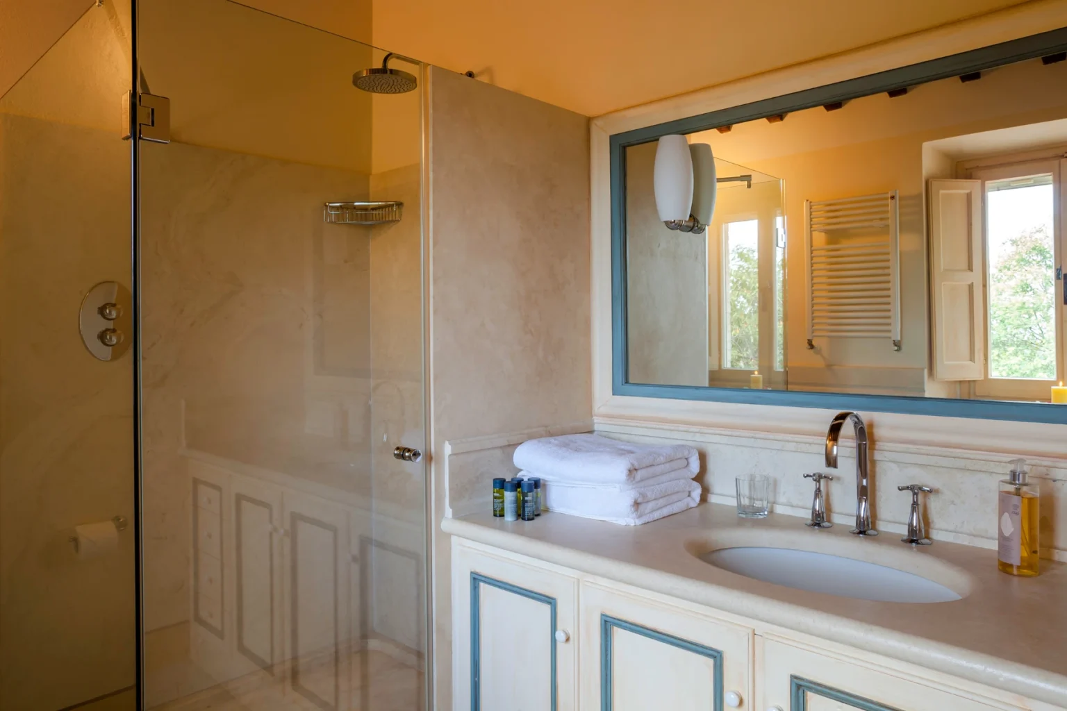 Bisenzio_Elegant_Farmhouse_Ensuite_Bathroom_Glass_Shower.webp | Only on SopranoVillas