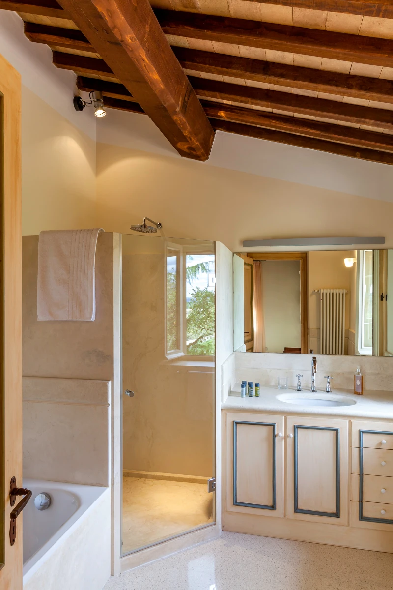 Bisenzio_Elegant_Farmhouse_Bathroom_Bathtub_Walk_In_Shower.webp | Only on SopranoVillas