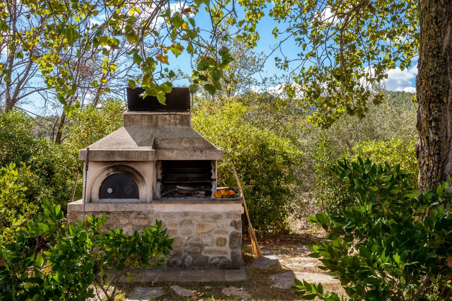 Bisenzio_Elegant_Farmhouse_Traditional_Wood_Fired_Pizza_Oven.webp | Only on SopranoVillas