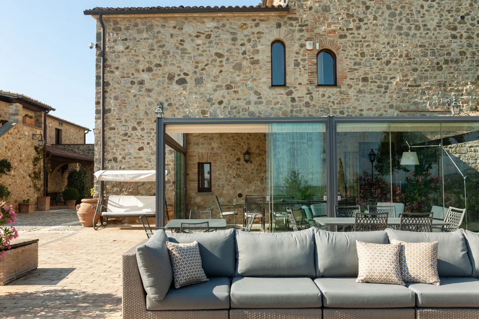 Bisenzio_Historic_Tower_Stone_Villa_Outdoor_Lounge_Area.webp | Only on SopranoVillas