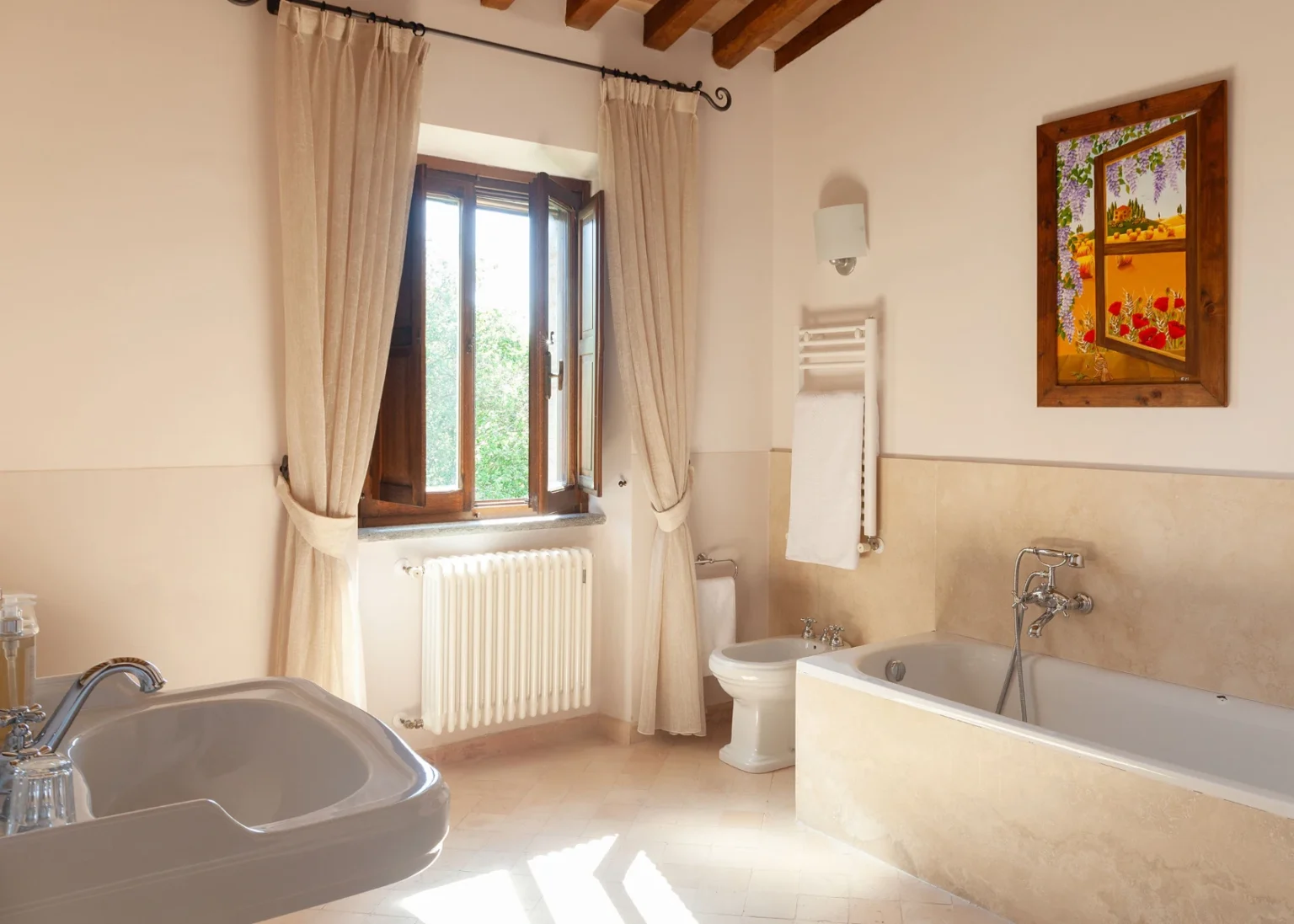 Bisenzio_Historic_Tower_Bright_Bathroom_Bathtub_Garden_View.webp | Only on SopranoVillas