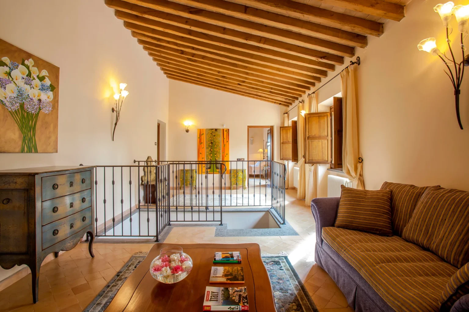 Bisenzio_Historic_Tower_Upper_Floor_Lounge_Seating_Area.webp | Only on SopranoVillas