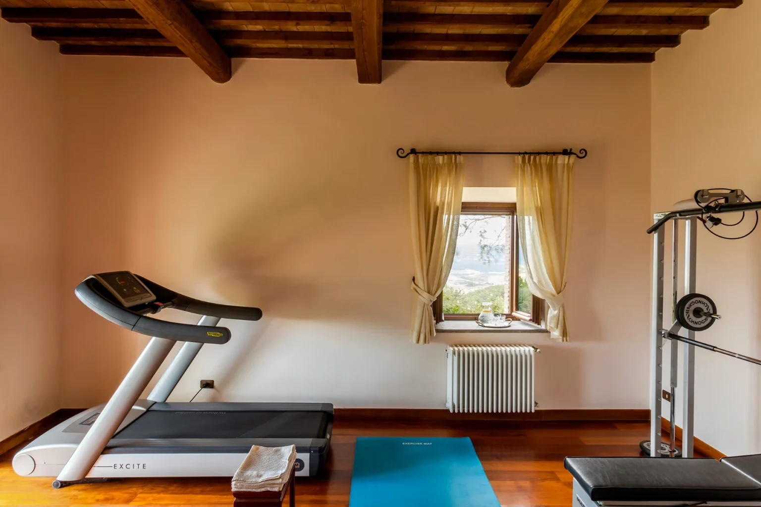 Bisenzio_Historic_Tower_Private_Gym_Fitness_Equipment.webp | Only on SopranoVillas