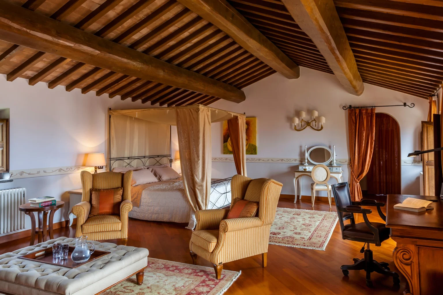 Bisenzio_Historic_Tower_Spacious_Master_Bedroom_Four_Poster_Bed.webp | Only on SopranoVillas