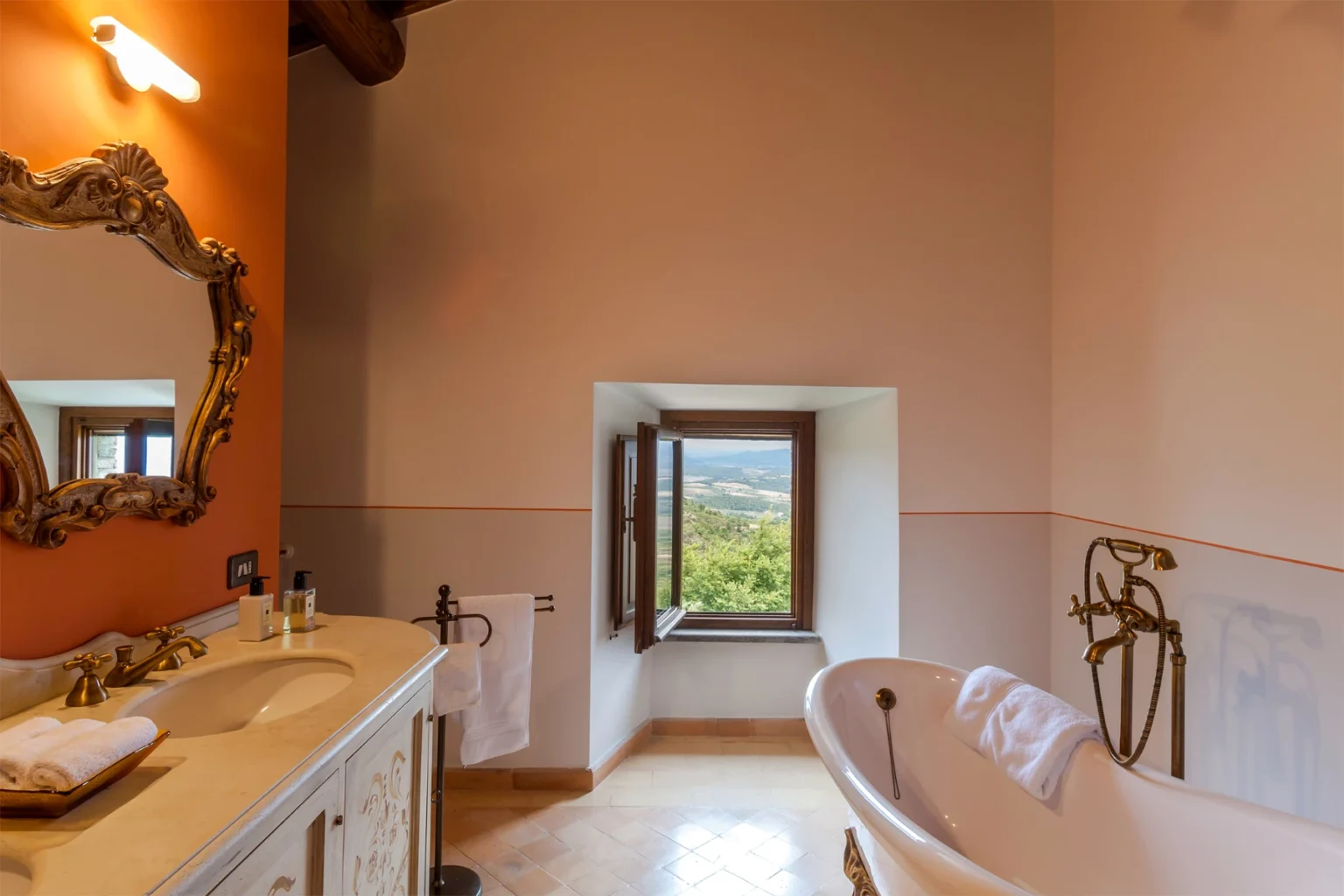 Bisenzio_Historic_Tower_Luxury_Ensuite_Bathroom_Freestanding_Bathtub.webp | Only on SopranoVillas