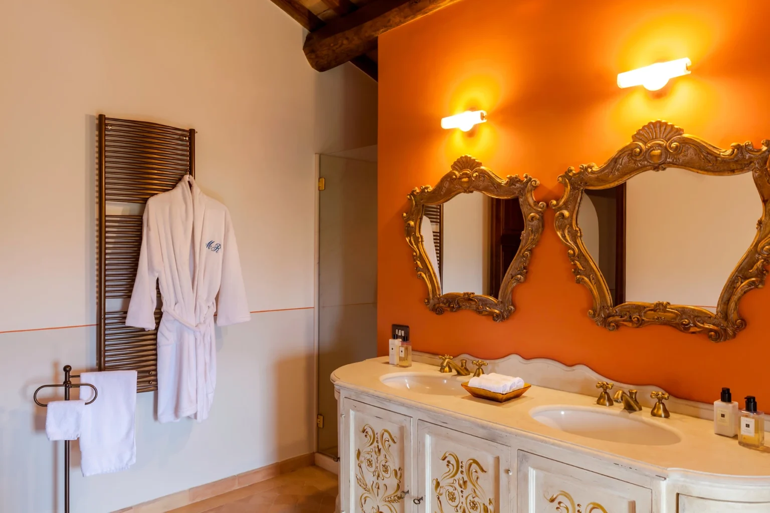 Bisenzio_Historic_Tower_Ensuite_Bathroom_Double_Vanity_Gold_Mirrors.webp | Only on SopranoVillas