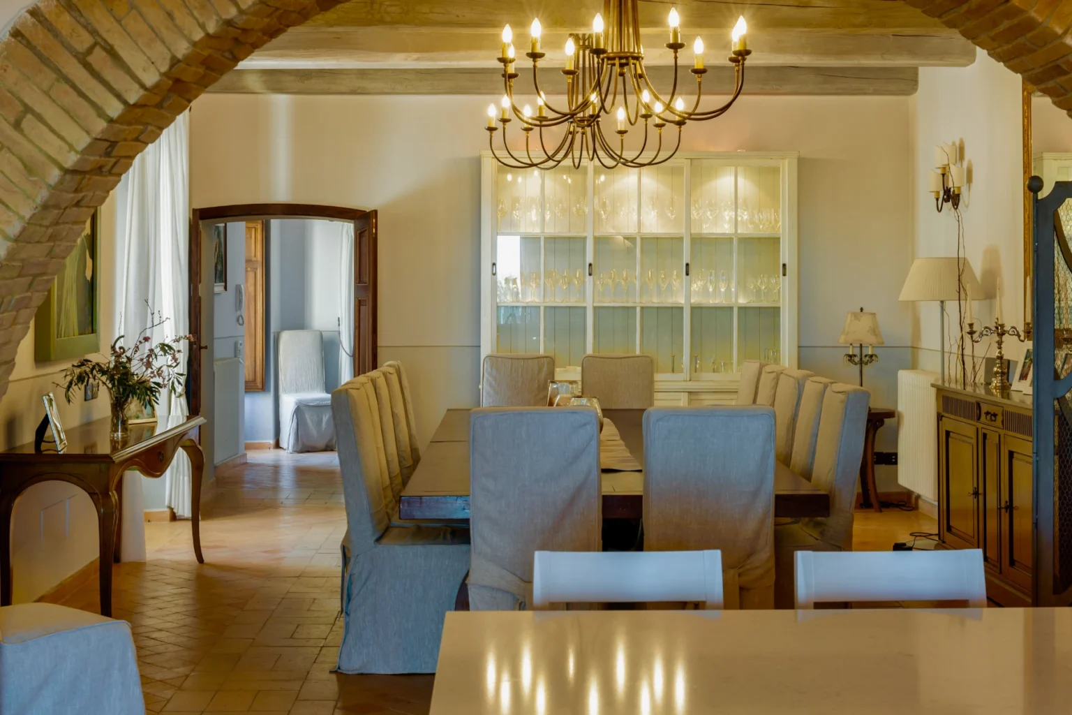 Bisenzio_Historic_Tower_Elegant_Dining_Room_Chandelier.webp | Only on SopranoVillas