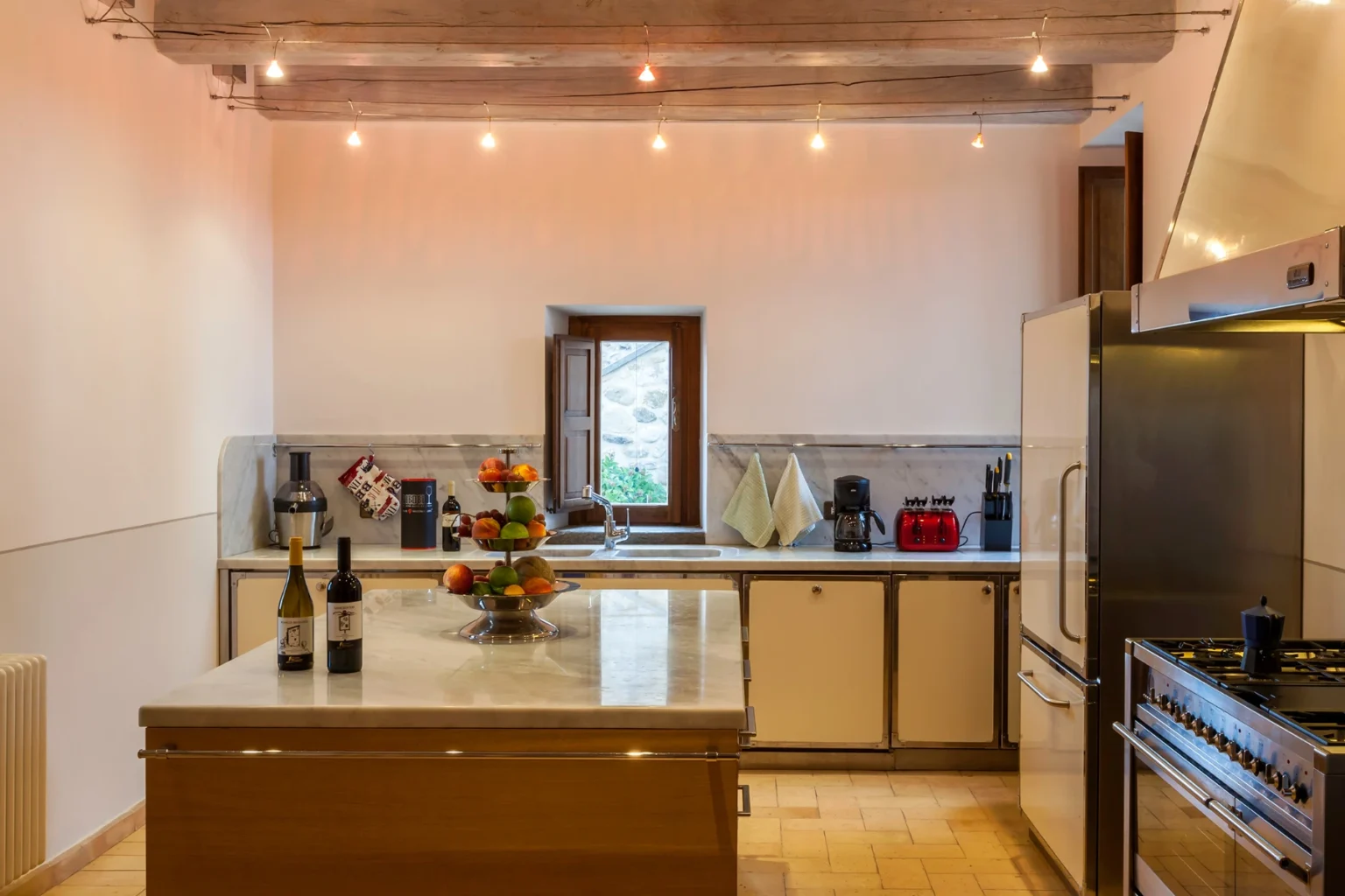 Bisenzio_Historic_Tower_Fully_Equipped_Kitchen_Central_Island.webp | Only on SopranoVillas