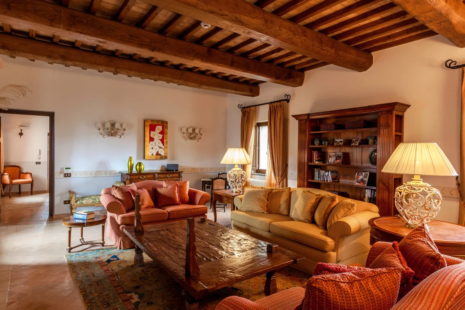 Bisenzio_Historic_Tower_Spacious_Living_Room_Rustic_Wooden_Beams.webp | Only on SopranoVillas