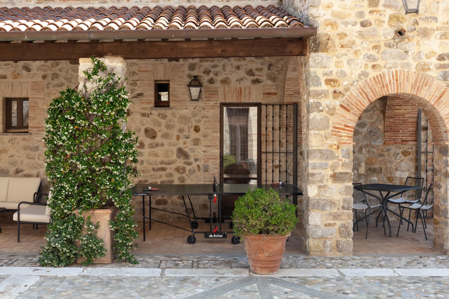 Bisenzio_Historic_Tower_Outdoor_Table_Tennis_Courtyard.webp | Only on SopranoVillas